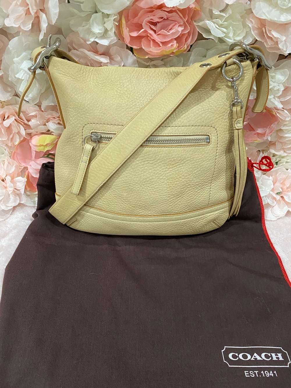 COACH Cream Pebbled Leather Bag with Tassel